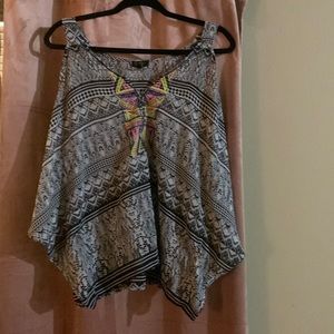 Jessica Simpsons off the shoulder shirt